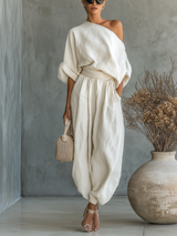 Ensemble Femme en Lin Blanc Cassé avec Top Décolleté Off-Shoulder et Pantalons Tapered
